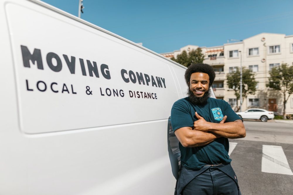 A mover next to the moving truck