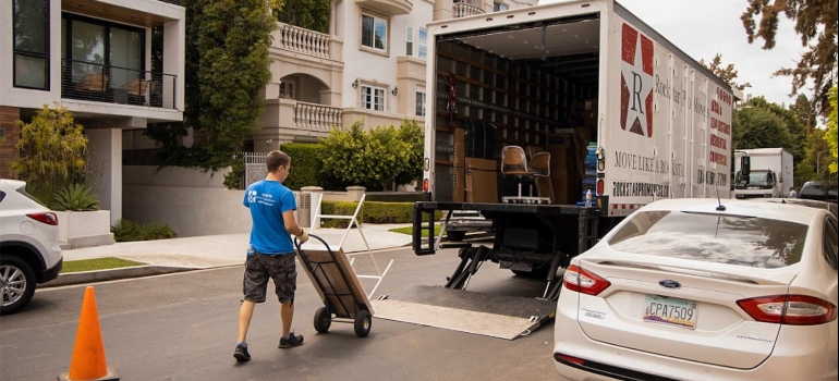 A mover loading a moving truck