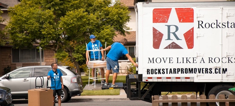 Movers San Fernando Valley packing things into a truck