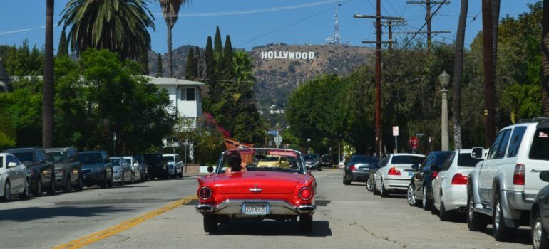 Red car on the road to Hollywood