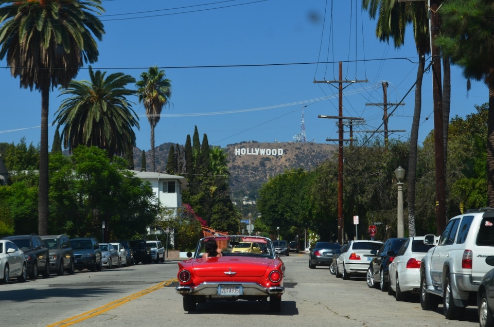 Man driving car before moving from LA