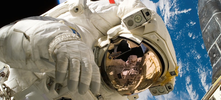 An astronaut trying to reach for something while thinking about 10 Best Live Music Venues in Los Angeles;