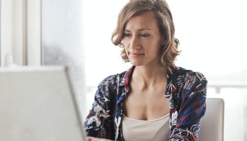 A woman booking movers in San Francisco