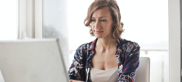 A woman booking movers in San Francisco