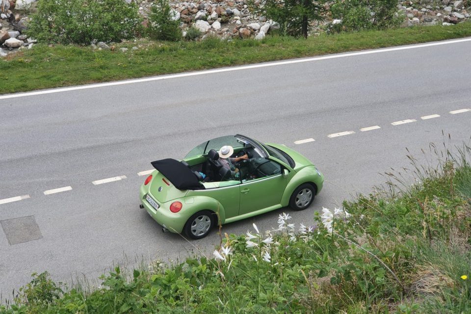 Green car on the road
