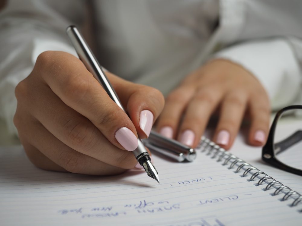 Picture of a person writing