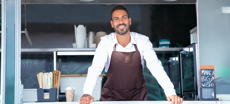 Picture of a man in a food truck 