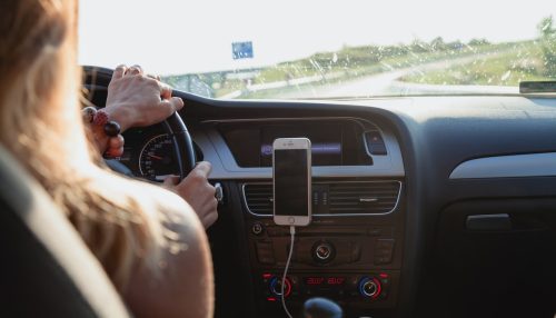 Picture of a person driving a car